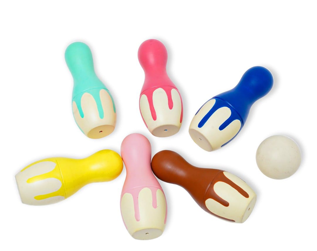 Pastel drip-style wooden bowling pin set